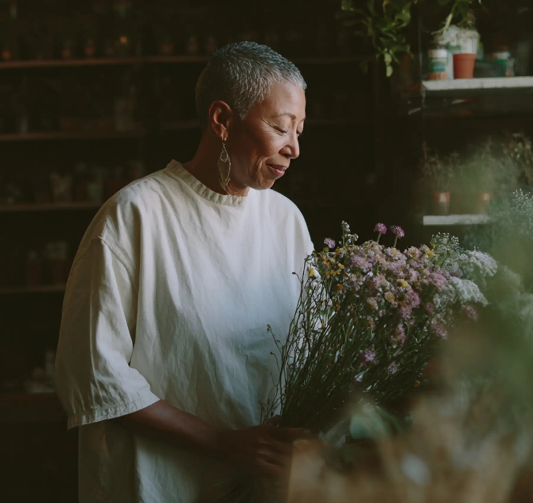 Person looking at flowers