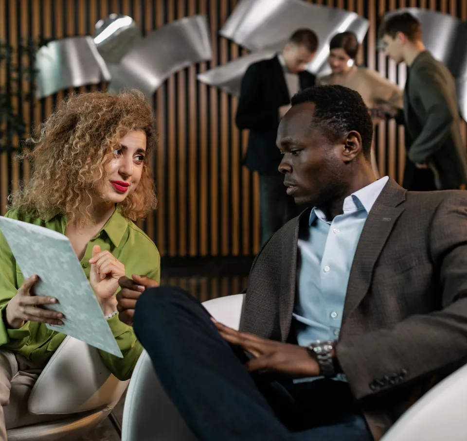 Team reviewing plans in a workshop