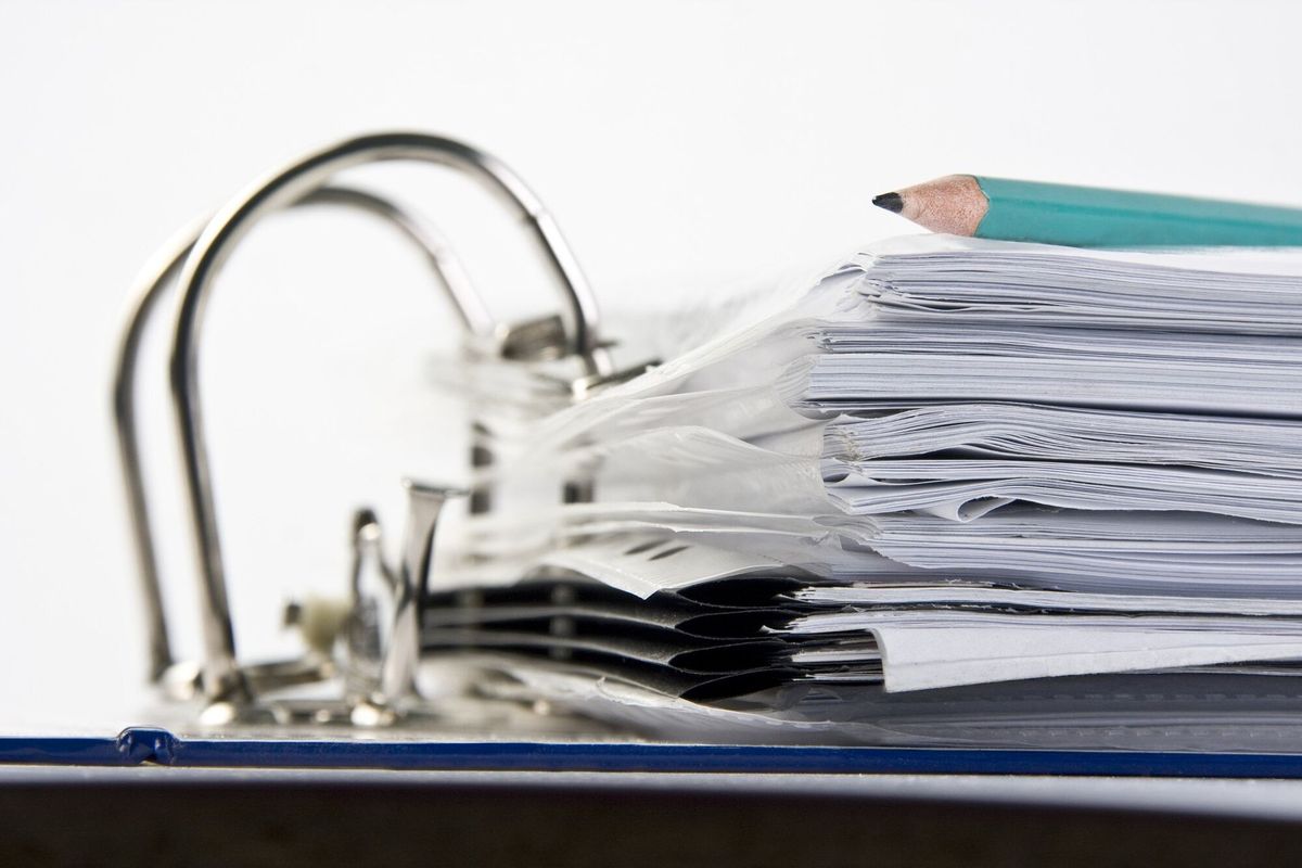 Binder with files and pencil