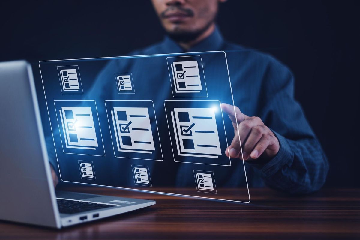 Businessman using computer for DMS documents management and ERP software for Document system management