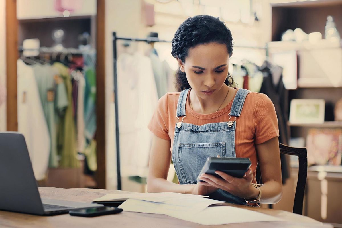Entrepreneur or confused seller of shop numbers startup store profit or retail budget